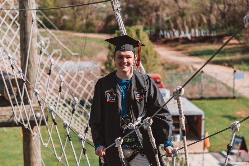 Logan Emory posing on the Challenge Course